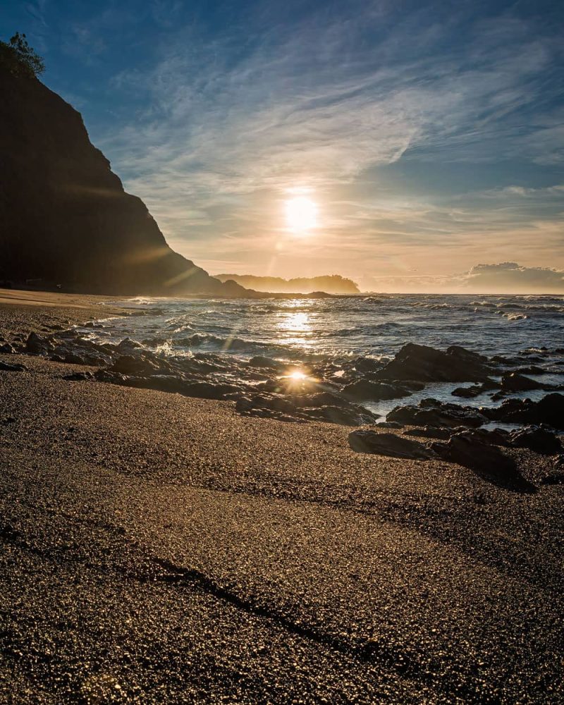 Golden sunrise photography on sand beach at Punta Samara - Costa Rica